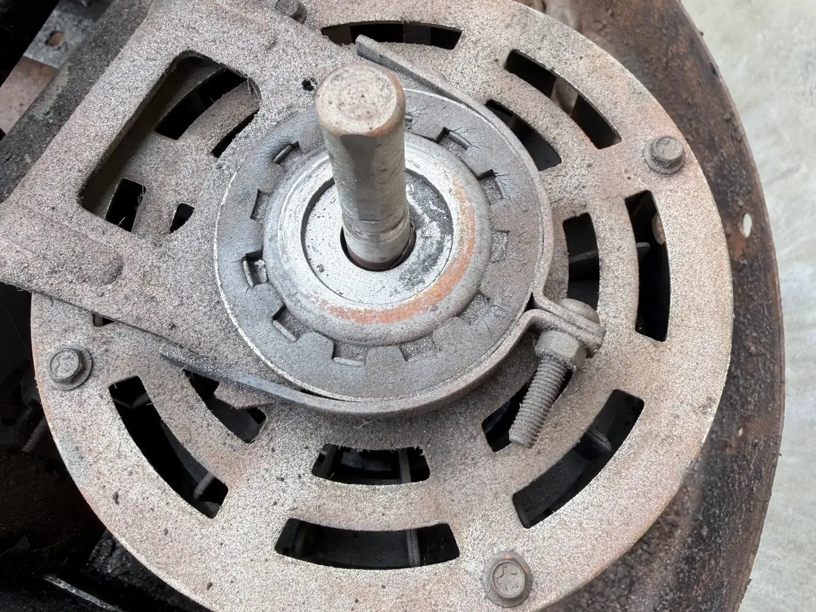 Worn blower motor removed from an air conditioning system