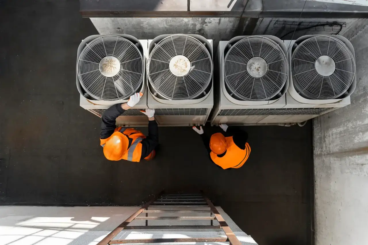 Doctor Fridge technicians servicing rooftop condensing units